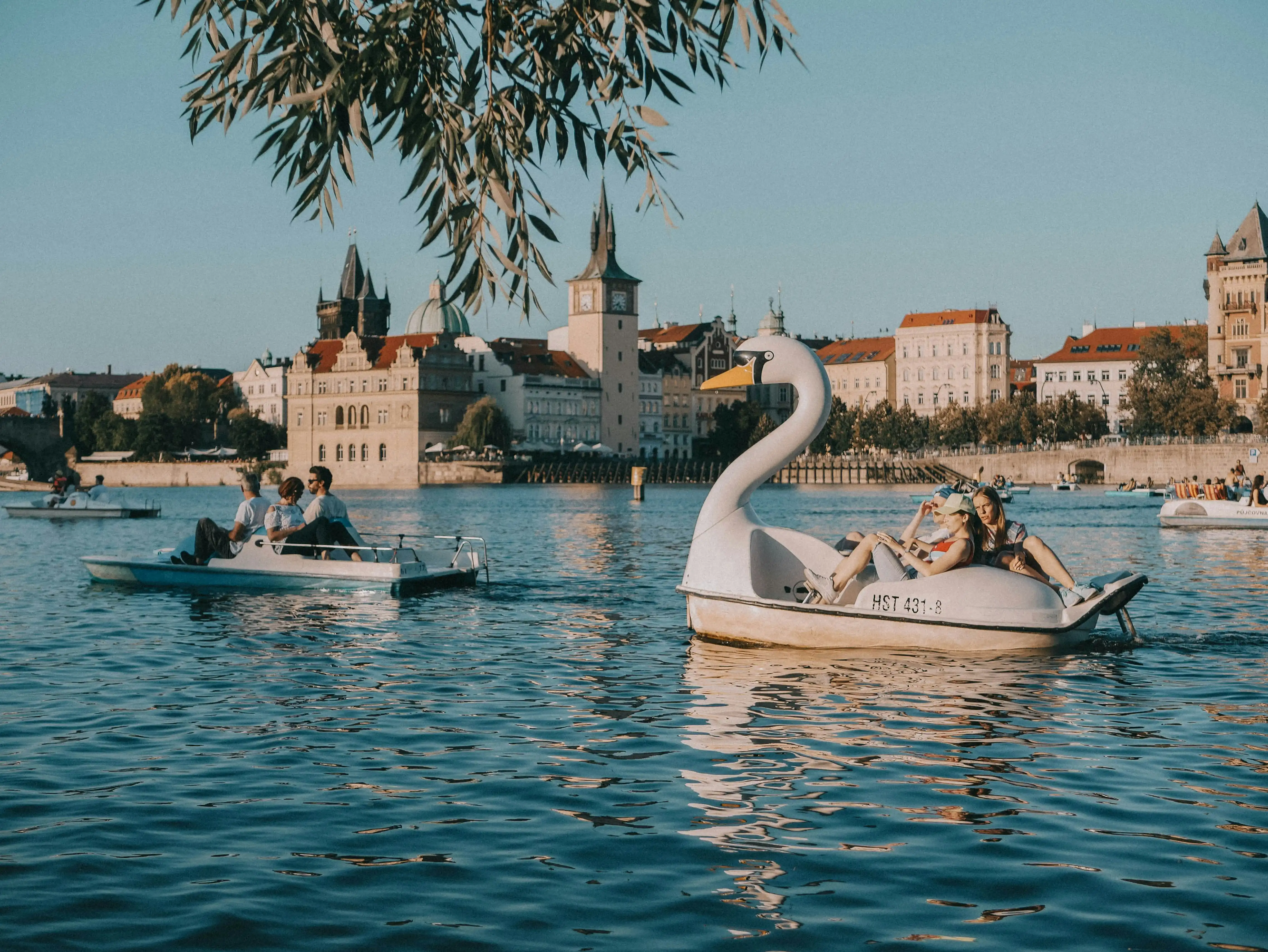 swan-shaped pedal boats on the Vltava River in Prague